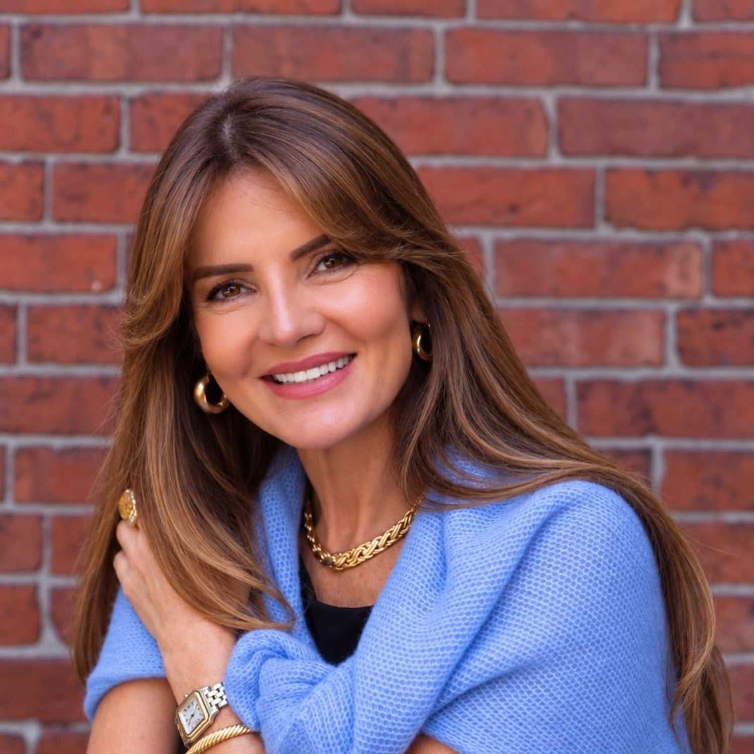 Portrait of Rosanna Miller, a professional stylist at Luxor Hair Studio, showcasing their expertise and style.
